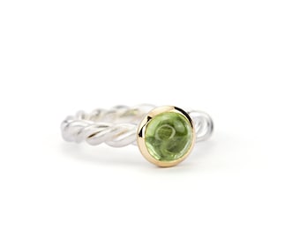 Kordelring Silber Gold mit Peridot Größe 55