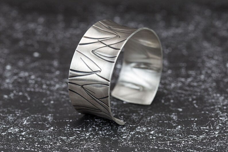 wide heavy silver bangle with pattern image 5