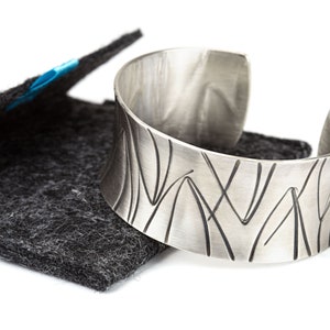 wide heavy silver bangle with pattern image 8