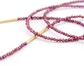 long dainty faceted garnet necklace 18K gold clasp