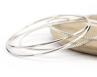 Small Silver Bangle Set of four