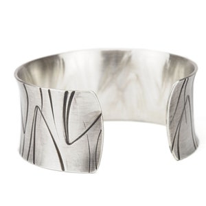 wide heavy silver bangle with pattern image 4