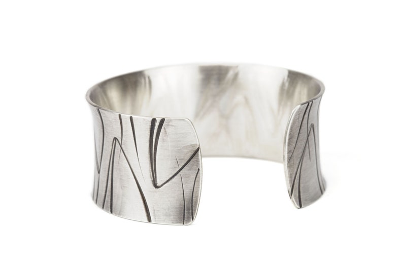 wide heavy silver bangle with pattern image 4