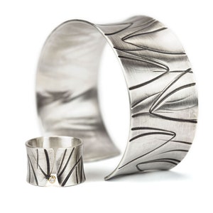 wide heavy silver bangle with pattern image 9