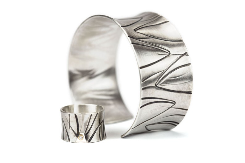 wide heavy silver bangle with pattern image 9