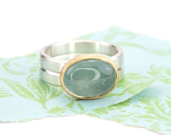 Aquamarinring Silber Gold ovaler Cabochon meerblaugrün