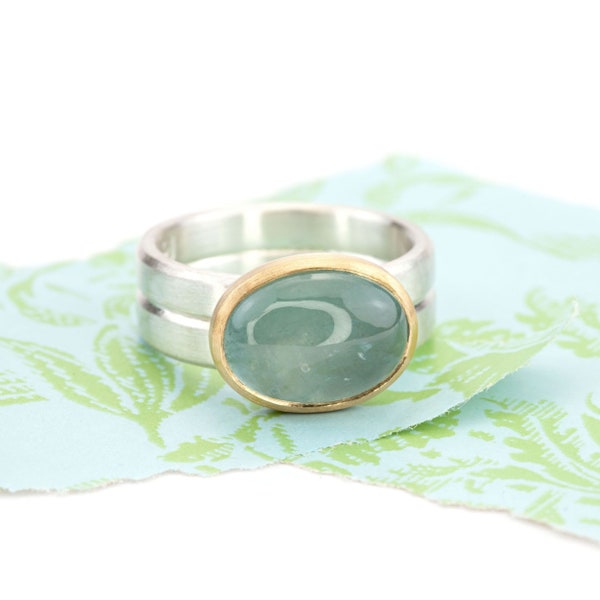 Aquamarinring Silber Gold ovaler Cabochon meerblaugrün