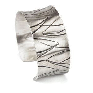 wide heavy silver bangle with pattern image 3