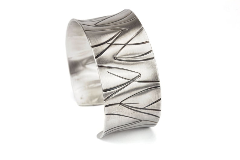 wide heavy silver bangle with pattern image 3