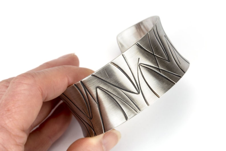 wide heavy silver bangle with pattern image 7