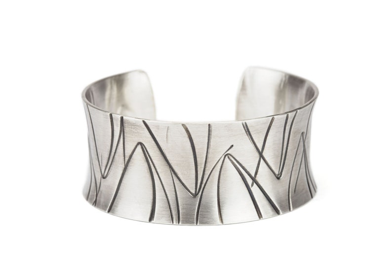 wide heavy silver bangle with pattern image 1