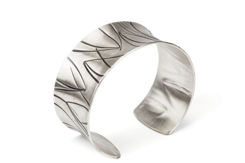 wide heavy silver bangle with pattern image 2