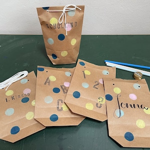 5 sacchetti regalo da riempire voi stessi, bambini della scuola, con il nome desiderato
