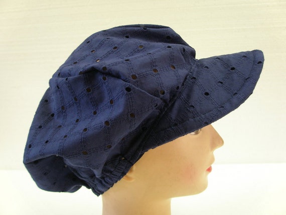 Sun hat with embroidered perforated pattern