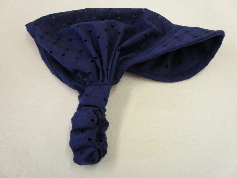 Hairband with shield made of perforated fabric image 3