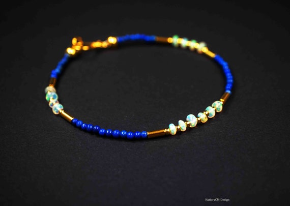 Lapis lazuli bracelet with Ethiopian opals (silver 925, gold-plated), hook closure