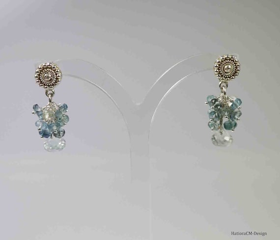 White topaz with Santa Maria aquamarines and morganites on a stud earrings made of silver 925