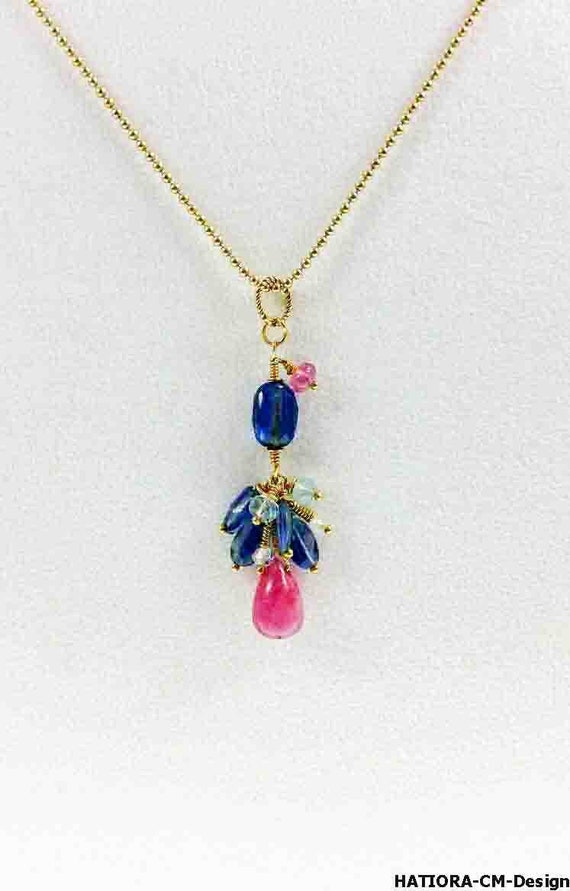 Ruby pendant with kyanite, white and light blue topazes in gold (24 K) Vermeil with ball chain (45 cm)