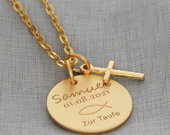 May include: Gold necklace with a round pendant that says "Samue 01.08.2021 Zur Taufe" with a fish symbol and a small cross charm.