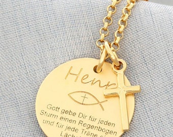 May include: Gold necklace with a round pendant that says "Henp" with a cross and a fish symbol. The pendant also has the text "Gott gebe Dir für jeden Sturm einen Regenbogen und für jede Träne ein Lächeln."