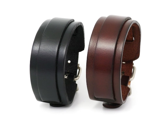 Leather cuffs etsy discount