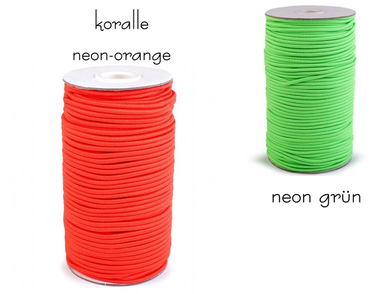 Pu&ograve; includere: Due bobine di cordoncino elastico, una arancione neon e una verde neon. Le bobine sono etichettate "koralle neon-orange" e "neon gr&uuml;n".
