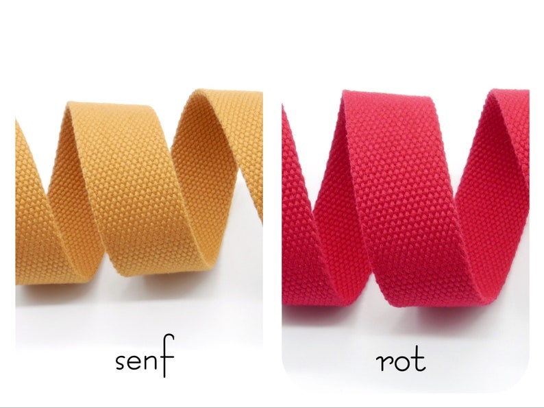 May include: Two rolls of woven cotton webbing, one mustard yellow and one bright red.