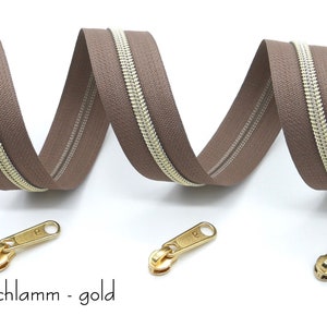 1 m endless zipper, metallized, wide, including 3 matching sliders, various brown tones Schlamm