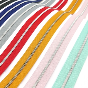 1 meter metallized zipper, narrow, incl. 3 sliders, various colors