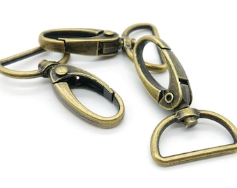 4 rotating carabiners, old brass, width approx. 25 mm