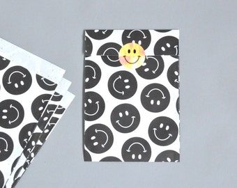 Geschenktüten Smileys nachhaltig schwarz weiß  | Papiertüten Geschenkverpackung Kindergeburtstag