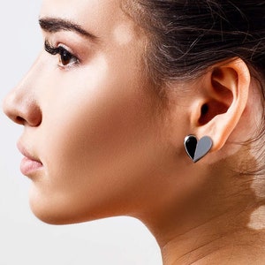 HEART-TO-HEART. Large two-tone heart studs. “Reflections” collection.