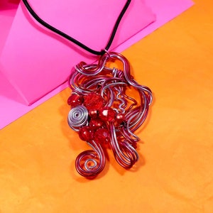 Musical Key large wire and bead pendant.