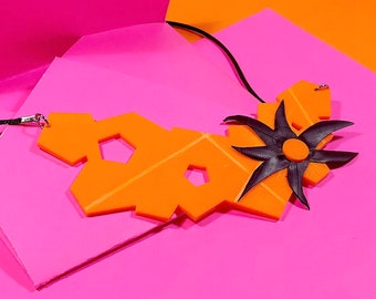 Orange pentagons necklace with black rubber accents