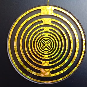 MWO Lakhovsky gold on clear acrylic glass