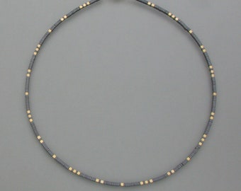 Delicate necklace hematite, gold-plated