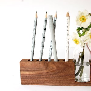 Pen holder with flower vase image 1