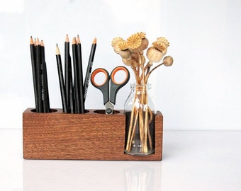 Pen holder with flower vase in nut