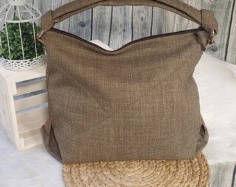 Handbag (color example brown) made of upholstered canvas in 18 different colors