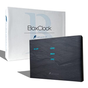 BoxClock slate look, wood look, white marble look, space, and much more. - LED grandfather clock with word display - The word clock for your desk