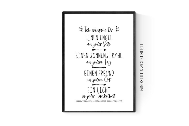 May include: A framed print with black text on a white background. The text, in German, reads "Ich w&uuml;nsche Dir Einen Engel an jeder Seite, Einen Sonnenstrahl an jedem Tag, Einen Freund an jedem Ort, Ein Licht in jeder Dunkelheit."