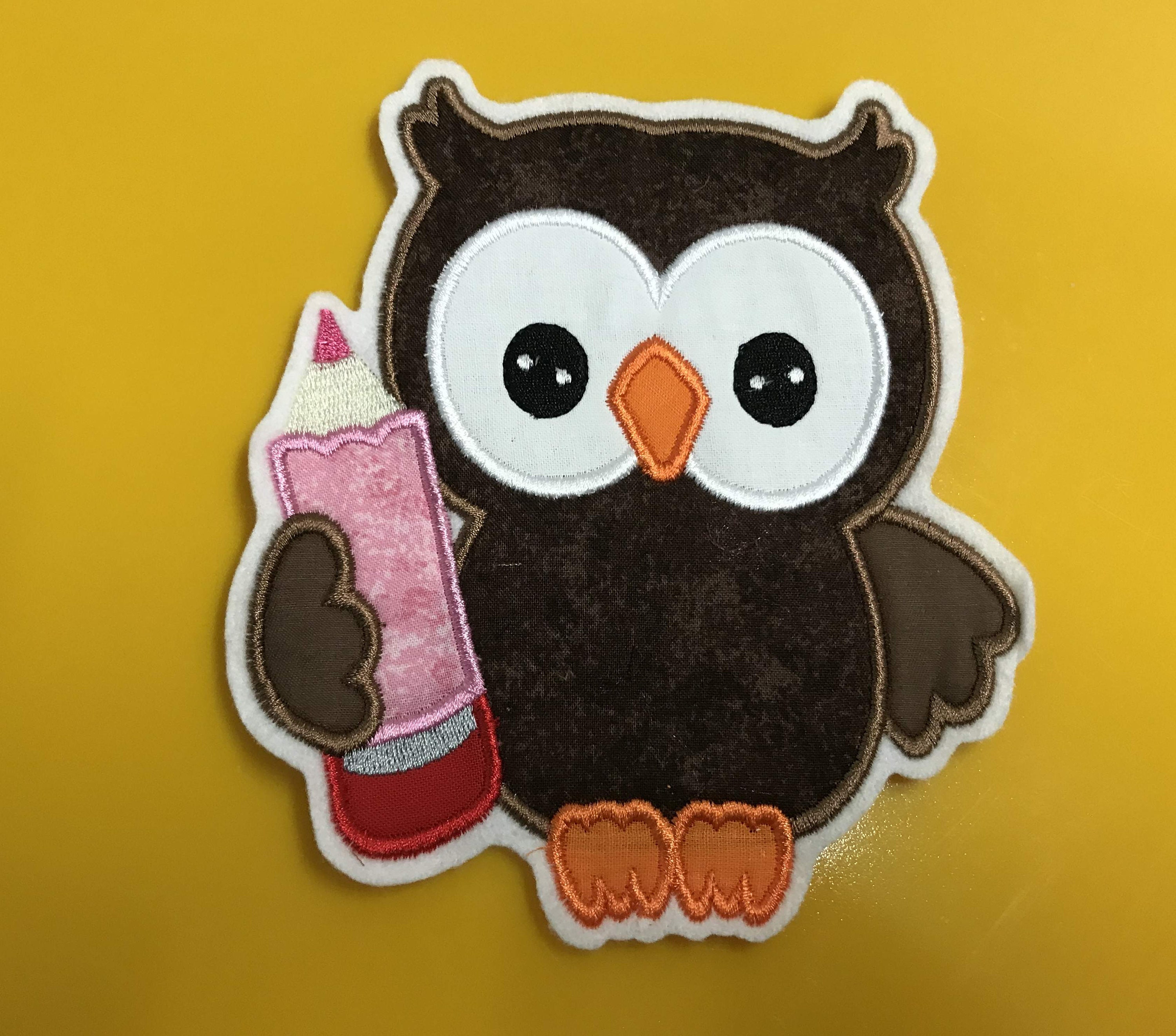 patch application - XL Owl with fret pen