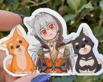 Puede incluir: Una pegatina con un personaje de dibujos animados con pelo gris y ojos rojos, flanqueado por dos perros de dibujos animados. El perro de la izquierda es naranja y el de la derecha es blanco y negro. El personaje lleva un atuendo con capucha.