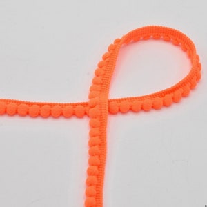 Mini pom pom guarnição 6 mm, laranja neon