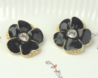 Large vintage flower clip-on earrings in gold with black enamel and rhinestones - statement earrings for women - retro fashion jewelry