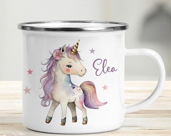 May include: White enamel mug featuring a colourful unicorn illustration and pink stars. The unicorn has a purple and pink mane and tail. The mug has a silver rim and handle. The name "Elea" is written in purple on the mug.