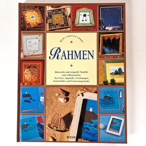 Könnte beinhalten: Ein Buchcover mit dem Titel "Mein liebstes Hobby: Rahmen". Das Cover zeigt eine Vielzahl von Rahmen mit unterschiedlichen Designs und Materialien, darunter Holz, Metall und Stoff. Das Buch handelt vom Bau von Rahmen für Fotos, Kunstwerke und andere Gegenstände.