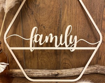 Lettering "Family" made of wood hexagon