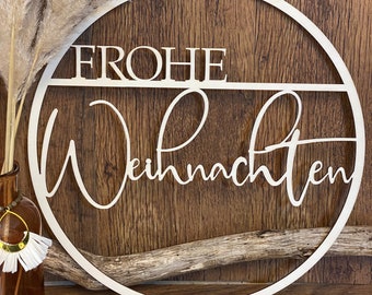 Lettering "Merry Christmas" made of wood