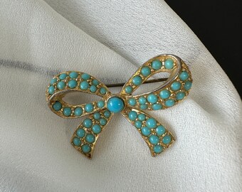 Turquoise strikbroche Vintage jaren 1960 prachtige turquoise kleur glazen kralen versierde broche